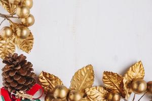 Kerstmissamenstelling van de gouden achtergrond van de bessengrens foto