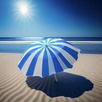 blauw en wit paraplu zittend Aan top van een zanderig strand. generatief ai. foto