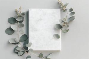 marmeren papier blanco, eucalyptus takken Aan pastel grijs achtergrond, genereren ai foto
