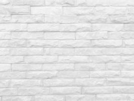 naadloze textuur van witte stenen muur een ruw oppervlak, met ruimte voor tekst, voor een achtergrond. foto