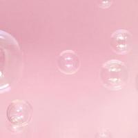 roze achtergrond met bubbels foto