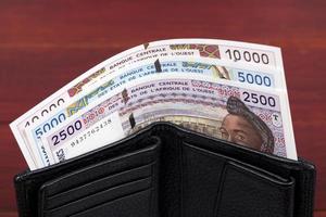 oud west Afrikaanse staten geld - franc in de zwart portemonnee foto