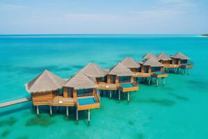 antenne visie van Maldiven eiland, luxe water villa's toevlucht en houten pier. neurale netwerk ai gegenereerd foto