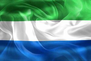 3D-illustratie van een vlag van Sierra Leone - realistische wapperende stoffen vlag foto
