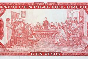 Mens voorzitten Bij onafhankelijkheid vergadering van uruguayaans geld foto