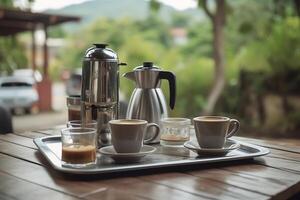 koffie mokken en koffie machine Aan de buitenshuis tafel. ai gegenereerd foto