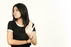 hou op of afwijzing gebaar van mooi Aziatisch vrouw geïsoleerd Aan wit achtergrond foto