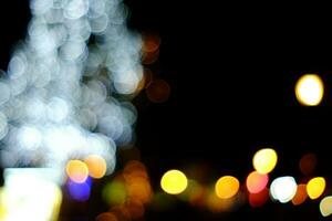 abstract bokeh van Kerstmis boom achtergrond. foto