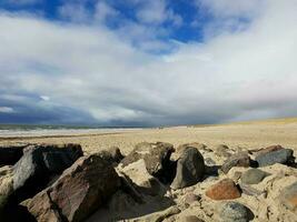 de eindeloos strand Bij de noordelijk zee hvidbjerg stranden blavand Denemarken foto