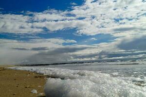 de eindeloos strand Bij de noordelijk zee hvidbjerg stranden blavand Denemarken foto