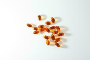 zacht gel, dichtbij omhoog van olie gevulde capsules, geschikt voor presenteren voedsel supplementen, vis olie, omega 3, omega 6, omega 9, vitamine a, vitamine d, vitamine d3, vitamine e, avond sleutelbloem olie, foto