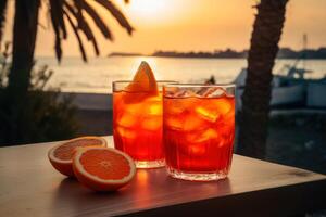 een vers oranje aperol spritz drinken in een zonsondergang dichtbij naar de oceaan gemaakt met generatief ai technologie. foto