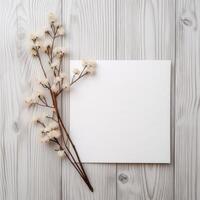 blanco wit papier kaart mockup en mooi bloemen Afdeling vlak leggen Aan houten tafel bovenkant, generatief ai. foto