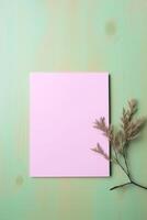 roze blanco papier kaart mockup en droog gras Aan groen houten structuur tafel top. generatief ai. foto