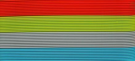 kleurrijk lakens plastic in kleuren van regenboog. veelkleurig foto