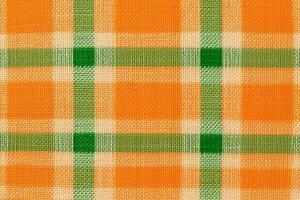 oranje kleding stof textiel patroon, plaid achtergrond, linnen katoen. ai generatief foto