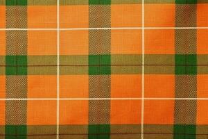 oranje kleding stof textiel patroon, plaid achtergrond, linnen katoen. ai generatief foto