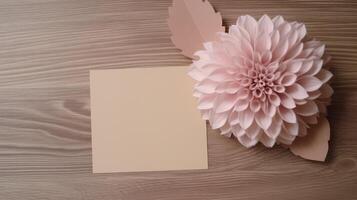 top visie van blanco plein papier kaart mockup met mooi dahlia bloem Aan houten tafel, generatief ai. foto