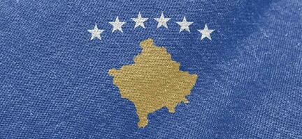 Kosovo kleding stof vlag katoen materiaal breed vlaggen behang gekleurde kleding stof Kosovo vlag achtergrond foto