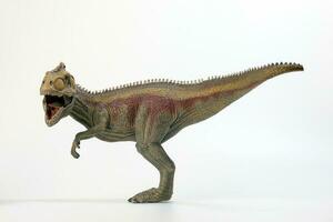 tyrannosaurus dinosaurus speelgoed- beeldje Aan wit achtergrond foto