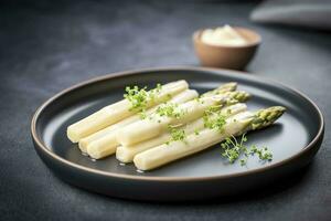 modern stijl traditioneel gestoomd wit asperges met genezen ham en hollandaise saus geserveerd net zo top visie Aan een nordic ontwerp bord met kopiëren ruimte, genereren ai foto