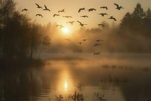 een kudde van kranen nemen vlucht over- een nevelig meer Bij zonsopkomst, genereren ai foto