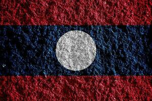 lao mensen democratisch republiek vlag Aan een getextureerde achtergrond. concept collage. foto