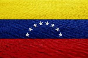 vlag van de Venezuela Aan een getextureerde achtergrond. concept collage. foto
