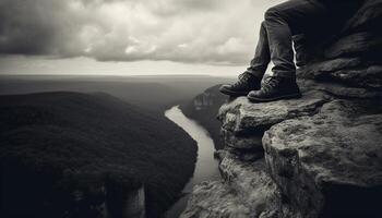 een persoon staand hoog omhoog, rots beklimming voor inspiratie gegenereerd door ai foto