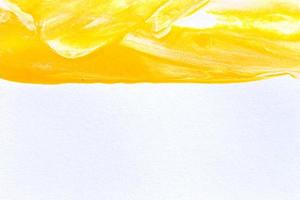 verf penseelstreek textuur achtergrond van gele aquarel