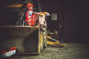 bulldozer graafmachine operator foto