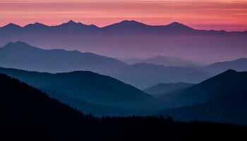 de majestueus berg reeks aftekenen tegen de rustig zonsondergang lucht gegenereerd door ai foto