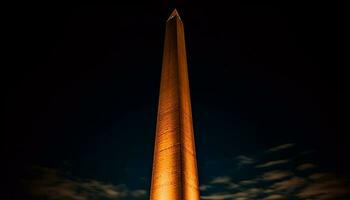 majestueus obelisk verlichte Bij nacht, symboliseert geschiedenis gegenereerd door ai foto