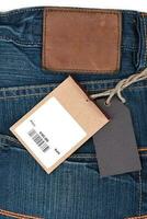 prijs label met streepjescode Aan jeans foto
