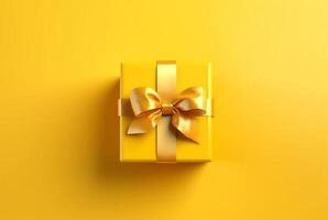 geschenk doos met gouden satijn lint en boog Aan geel achtergrond. vakantie geschenk met kopiëren ruimte. generatief ai foto