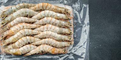 bevroren garnaal rauw Gamba's zeevruchten garnaal maaltijd voedsel tussendoortje Aan de tafel kopiëren ruimte voedsel achtergrond rustiek top visie foto