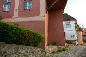 een mooi middeleeuws citadel stad van sighisoara in de hart van Roemenië, Transsylvanië reizen bestemming in oostelijk Europa. foto