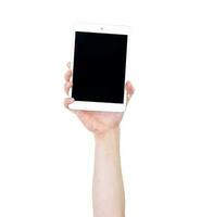 man's arm verheven Holding een tablet. technologie concept. isoleren Aan wit achtergrond. foto