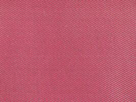 industrieel stijl roze kleding stof achtergrond foto