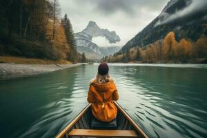 vrouw is het zeilen Aan boot Aan meer in mooi berg landschap. generatief ai foto