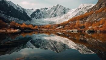 majestueus berg reeks weerspiegelt rustig tafereel, perfect voor wandelen avonturen gegenereerd door ai foto