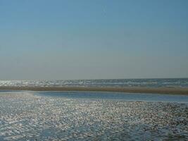 de strand van de haan Bij de noorden zee foto