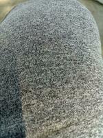 foto van de structuur van een grijs joggingbroek