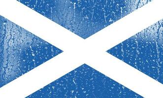 3d vlag van Schotland Aan een glas met water laten vallen achtergrond. foto