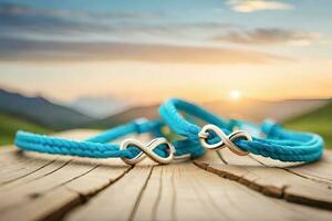 een dichtbij omhoog fotograaf van een paar- blauw armband vormen een oneindigheid symbool Aan een rustiek hout met bokeh achtergrond foto