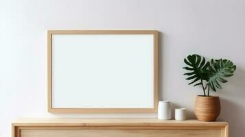 blanco houten canvas kader Aan wit muur met houten kabinet en keramisch vaas decoratie. generatief ai foto
