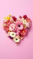 roze hart gemaakt van bloemen. hart vorm gemaakt van voorjaar bloemen Aan roze pastel achtergrond. ai gegenereerd foto