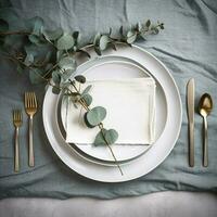 plaats instelling voor diner. elegant tafel versierd met eucalyptus takken. ai gegenereerd foto