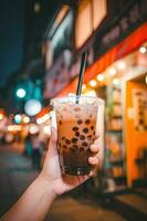 generatief ai illustratie van hand- Holding Taiwan melk thee en wazig achtergrond foto