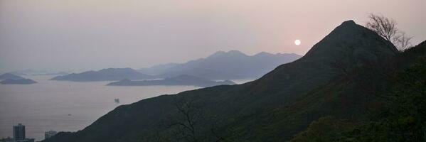 hong Kong eiland Bij zonsondergang foto